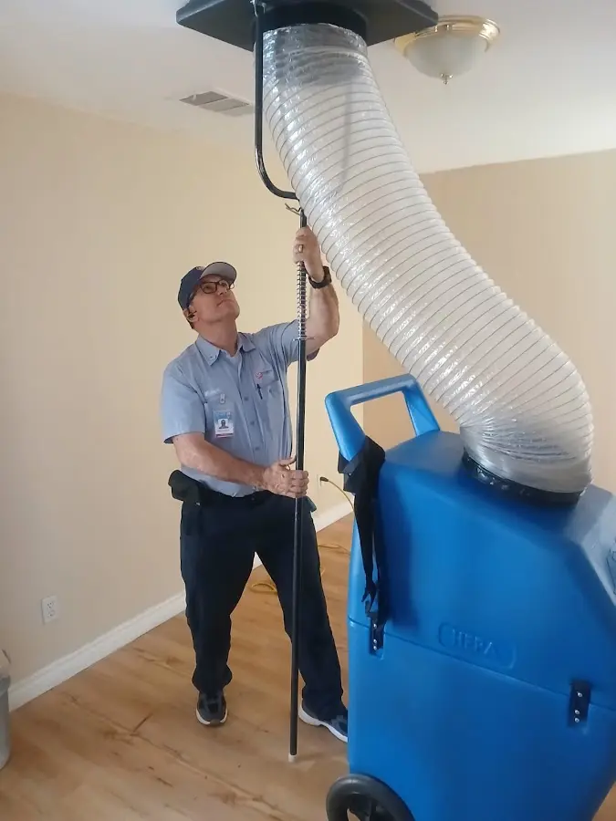Mini Split Installation technician using HEPA equipment in Florida City